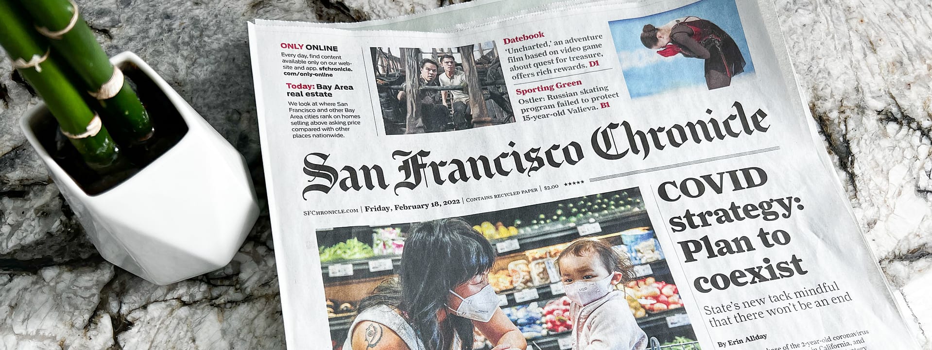San Francisco Chronicle newspaper folded on a table
